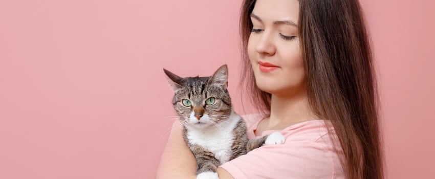 Young Women Holding a Cat